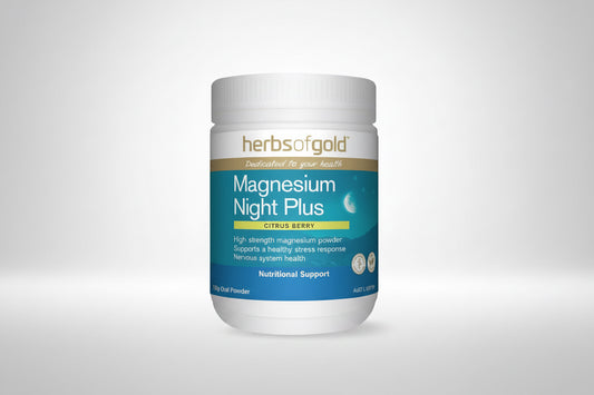 A white plastic bottle of Herbs of Gold Magnesium Night Plus dietary supplement, featuring a teal and blue label with white and gold text, on a clean white background.